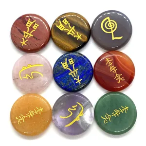 9-piece Reiki energy stones set with engraved gold symbols on round natural gemstones