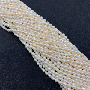 Natural white freshwater pearl strand necklace with smooth luster and irregular oval shape