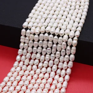 Detailed macro view of white irregular freshwater rice pearls for DIY jewelry making