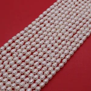 Macro detail showing natural freshwater baroque pearls with visible surface growth texture