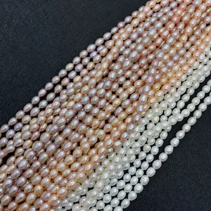 Macro shot of AAA natural freshwater pearls in white, pink, and purple for jewelry DIY
