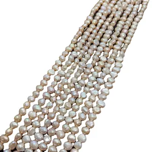Tiras de perlas naturales de agua dulce en color blanco crema y rosa con brillo nacarado intenso