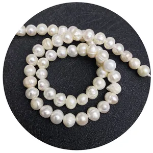 Fil de perles d'eau douce naturelles blanches lustrées pour la création de bijoux
