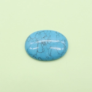 Oval blue turquoise stone cabochon with natural black veins for jewelry making