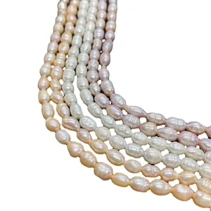 Perles de riz naturelles d'eau douce en blanc rose et violet pour colliers