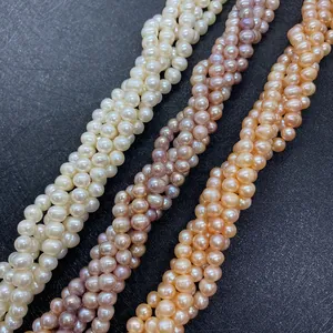 Detailed view of multi-strand twisted natural freshwater pearls in white pink and purple