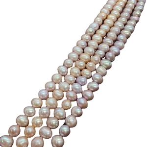 Strand of natural freshwater pearls in pink, purple and orange tones for DIY jewelry