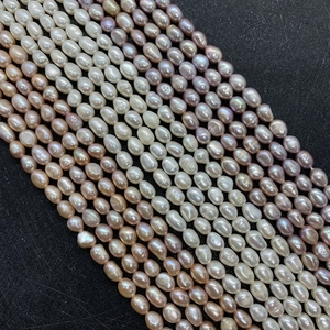 Natural freshwater pearl strands in white, pink, and lavender colors for DIY jewelry making