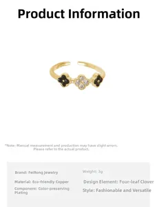 Detail of clover ring in gold-plated brass with black enamel and micro-inlaid stones