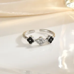 Sparkling silver clover open ring with black enamel and white zircon stones