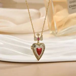 Vintage Herz-Medaillon Halskette mit rotem Edelstein und Kronenmotiv auf Goldkette