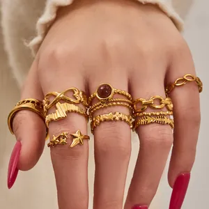 Set of 10 vintage 18K gold plated stainless steel rings with stars and Roman numerals