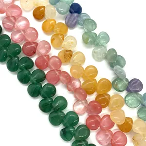 Detailed view of polished heart-shaped natural stone beads for DIY jewelry making