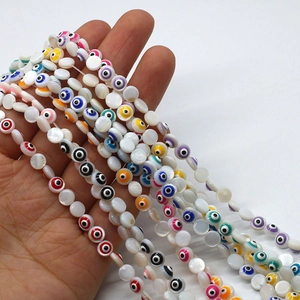 Flache Evil Eye Perlen aus Naturmuschel in bunten Farben für DIY-Schmuck