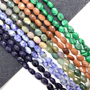 Gefacetteerde ovale edelsteenkralen van malachiet en goudsteen voor DIY-sieraden