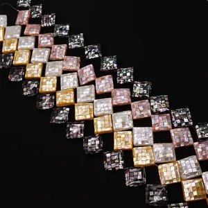 Macro detail of natural mother of pearl mosaic tiles with iridescent shell texture