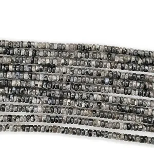 Flat round watermelon crystal stone beads 2x4mm with grey black spotted ink textures