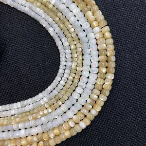 Natural shell abacus beads in cream white and champagne gold with pearl luster
