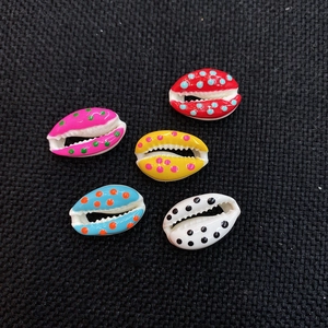 Five colorful polka dot painted natural cowrie shells for DIY jewelry making