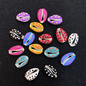 Hand-painted natural cowrie shell beads with colorful polka dots for DIY jewelry making