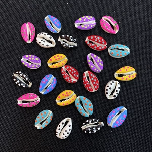 Colorful mixed shell-shaped beads with polka dot patterns for DIY bracelet making