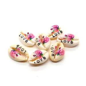 Natural cowrie shell beads with pink flower prints and LOVE text for DIY jewelry
