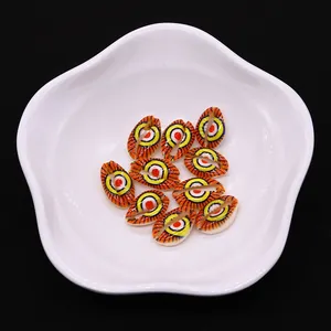 Macro shot of 9x19mm evil eye natural conch shell beads for DIY jewelry making