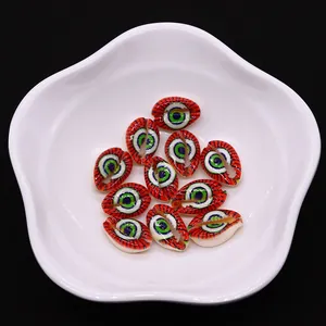 Detailed macro view of striped evil eye shell beads for DIY jewelry making