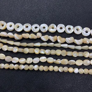 Perle naturali di madreperla in varie forme irregolari nei colori bianco e giallo