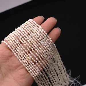 Detailed close-up of 3-4mm cream white natural freshwater rice pearls for DIY jewelry