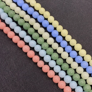 Macro view of colorful 6-10mm luminous chalcedony round beads for DIY jewelry making