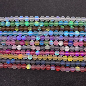 Macro shot of colorful matte synthetic moonstone beads for DIY jewelry making
