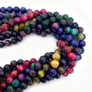 Vibrant mixed color tiger eye stone beads showing natural silk luster and cat eye effect