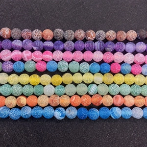 Detail view of 8mm colorful dragon vein agate round beads for DIY jewelry making