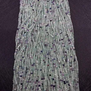 Detailed macro view of multi-colored faceted natural fluorite beads for DIY jewelry