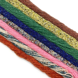 Macro view of multi-colored faceted 2-4mm natural stone beads for DIY jewelry making