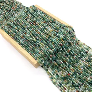 Faceted natural Indian Agate gemstone beads for DIY jewelry making on wooden tray