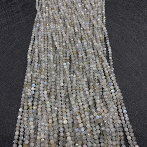 Macro shot of natural faceted Labradorite beads with blue flash for DIY jewelry making