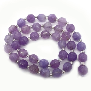 Faceted purple natural stone beads with silver spacers in a spiral necklace arrangement