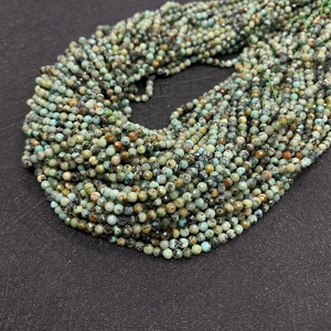 Macro shot of 2-4mm faceted African turquoise round beads for DIY jewelry making