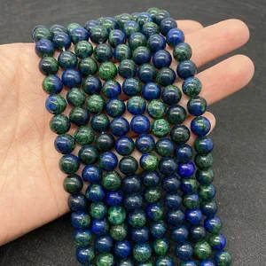 Macro shot of natural Phoenix Lapis Lazuli beads for DIY jewelry making and crafting