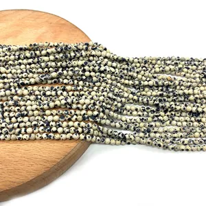 Faceted Dalmatian Jasper beads 2-3mm on wood tray for DIY jewelry making