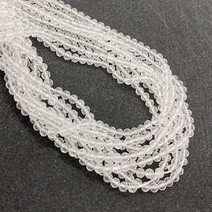 Macro shot of clear faceted natural stone beads for DIY jewelry making and bracelet crafts