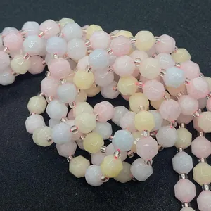 Macro detail of faceted natural morganite beads in pastel macaron colors for DIY jewelry