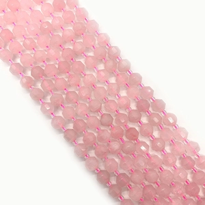 Macro detail of faceted rose quartz beads with soft pink hue for DIY jewelry design