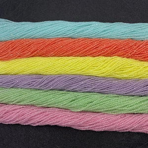 Macro shot of 2mm-5mm faceted colorful cat eye stone beads for DIY jewelry making