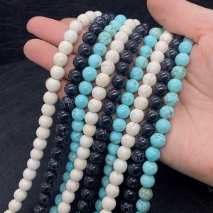 Detail of 8mm round natural stone beads with crackle texture for DIY bracelets