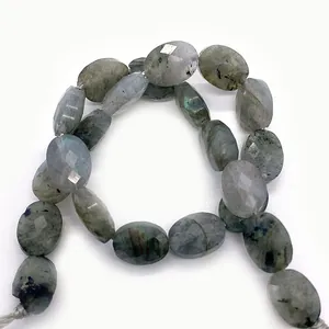 Perle ovali sfaccettate di labradorite con riflessi blu per gioielli fai-da-te