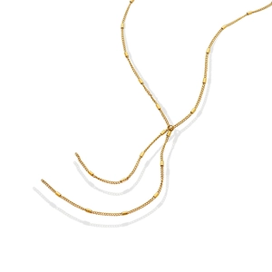 Elegante gouden Y-vormige titanium stalen ketting met geometrische kwastjes op wit
