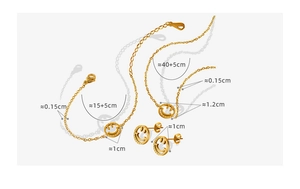 Detailansicht des goldenen Schmucksets mit Smileys und präzisen Größenangaben